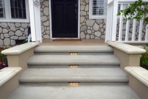 Our design for the concrete walkway includes concrete bull nose steps as you can see in the picture. Description from trulandscape.com. I searched for this on bing.com/images Concrete Front Steps, Modern Landscape Lighting, Concrete Front Porch, Front Door Steps, Front Porch Steps, Front Stairs, Front Porch Lighting, Traditional Porch, Brick Steps