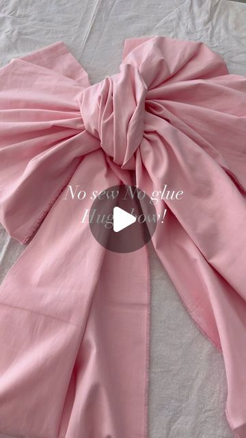 Nicole Flower on Instagram: "No sew and No glue 🎀
Hobby Lobby fabric 3 yards 
Fold over in half long ways
Tie a knot in the center then lace the bow through the knot on either side, fluff and voila!

#bows #pinkbow #hugebow #prettyinpink #valentinesdaydecor #diy #diycrafts #diydecor" Huge Bow Diy, Giant Bow Diy, Hobby Lobby Fabric, Fancy Birthday, Giant Bow, Tie A Knot, Knots Diy, Spring Baby Shower, Bow Making