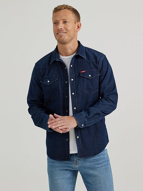 WESTERN INSPIRED AESTHETICWhen you're looking for Western aesthetics with exceptional comfort, our Wrangler® Men's Cowboy Wash Denim Shirt has you covered. Our Wrangler Cowboy Wash leaves this denim shirt so comfortable and soft that you'll think it's been lived in for years. Couple this denim snap shirt with your favorite pair of Wrangler jeans and cowboy boots for a proper denim tuxedo, or leave it unfastened with a plain white t-shirt for a laid-back look. Denim Tuxedo, Wrangler Cowboy, Plain White T Shirt, Workwear Jeans, Denim Shirt Men, Wrangler Shirts, Mens Cowboy, Mens Workwear, Outdoor Pants