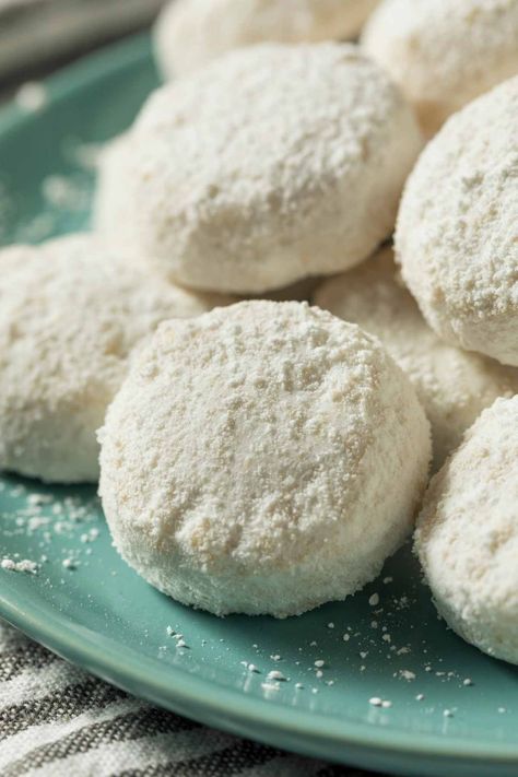 Also known as Mexican wedding cakes, these delicious Mexican Wedding Cookies are soft, sweet, and melt in your mouth. They’re delicately flavored with vanilla, and the crushed pecans add a delicate crunch. Mexican Wedding Cakes, Mexican Flan, Authentic Mexican Desserts, Mexican Wedding Cookies Recipes, Traditional Mexican Desserts, Wedding Cookies Recipe, Mexican Wedding Cake, Mexican Desserts, Spanish Desserts