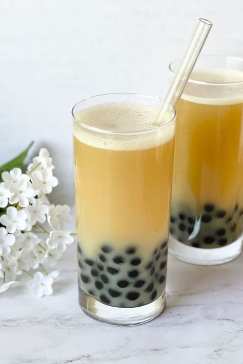 How to make a delicious jasmine milk tea at home with honey boba. This easy recipe will have you enjoying a sweet creamy drink in no time! #jasminetea #milktea #honeyboba #bubbletea Jasmine Milk Tea, Oolong Milk Tea, Jasmine Milk Tea Recipe, Honey Boba, Milk Tea Recipe, Tea With Honey, Milk Tea Recipes, Tea At Home, Boba Drink