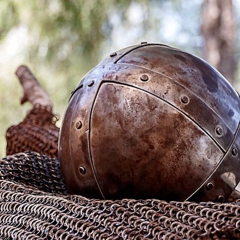 An ancient knightly helmet covered with rust, lying on a chain armor Rusted Armor, Copper Armor, Riders Of Rohan, Chain Armor, Cd Project, Fantasy Classes, Fallen Star, Knights Of The Round Table, Elf Druid