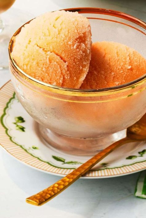 Meet your new favorite summer porch treat: no-churn cantaloupe sorbet. This ultra refreshing, not-too-sweet sorbet makes great use of in-season cantaloupe (although you could also make it with honeydew). It also only uses six ingredients, one of which is white balsamic vinegar that adds just the right amount of sweet brightness. No special equipment needed! #sorbet #cantaloupe #summerdesserts #vegandessert #dairyfreedessert Cantaloupe Aesthetic, Cantelope Sorbet, Cantaloupe Sorbet Recipes, Cantaloupe Sorbet, Cantaloupe Recipes, Sorbet Is, Coconut Sorbet, Gelato Recipe, White Balsamic