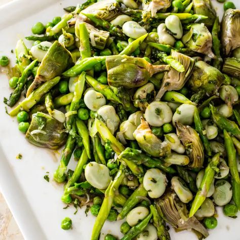 Fava Beans with Artichokes, Asparagus, and Peas | America's Test Kitchen Green Lima Beans, Asparagus And Peas, Spring Produce, Fava Bean, America's Test Kitchen Recipes, Pea Recipes, Bean Seeds, Fava Beans, America's Test Kitchen