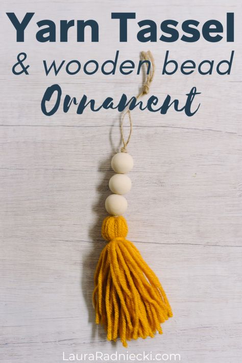 How to Make a Yarn Tassel and Wooden Bead Ornament Boho Bead Ornaments, Wooden Bead Tassel Diy, Tassel Christmas Tree Ornament Diy, Diy Tassel Christmas Ornaments, How To Make Beaded Tassels, Tassel With Beads Diy, How To Make A Beaded Tassel, Wooden Beads With Tassel, Wooden Bead Crafts Christmas