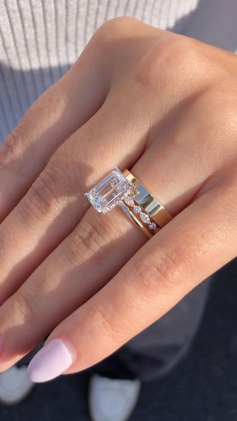 A love story set in gold and 💎✨ #happilyeverafter #emeraldcutdiamond #engagementring #diamondrings #hiddenhalo #radiantcut #engaged… | Instagram Stacked Wedding Rings Square, Engagement Rings Gold With Wedding Band, Two Band Wedding Ring Set, Dream Rings Wedding, Rectangle Cut Wedding Ring, Ring Stack With Engagement Ring, Gold Ring Stack Wedding, Mixed Metals Wedding Stack, Radiant Wedding Ring Set Gold