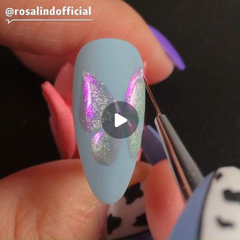 Rosalindbeauty on Instagram: "Butterfly cat eye Nails💜🦋 Very bright nails and very beautiful effect! Ice -Cat-Eye Nails,magical and unpredictable🤩 . . . . . . . . . . . . . . . . . . . . . . #cateye #cateyegel #cateyegelpolish #cateyenails #nailart #summercateye #silvernails #glitternails #nudenails #autumnnails #rosalindnails #autumnnails2020 #babyboomernails #rosalindofficial #gelpolish #nialart #naildesign #nailporn #acrylicnails #gelnals #nails #nailart #nailshapes #nailswag" Firework Nail Art Cat Eye, Butterfly Cat Eye Nails, Diamond Cat Eye Nail Art, Purple And Blue Cat Eye Nails, Cateye Nailart, Spring Cat Eye Nails 2024, Butterfly Cat, Butterfly Nail Designs, Cat Eye Gel Polish