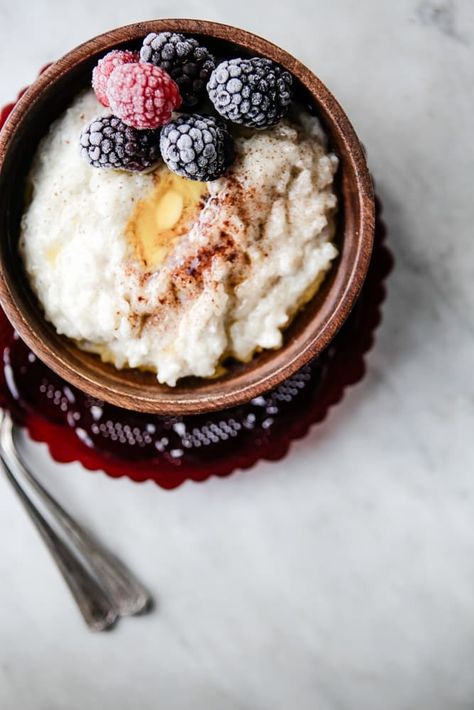 Risgrøt—a festive Norwegian rice pudding—is a heart-warming, soul-satisfying treat that is humble, almost too easy, and impossible not to love. How To Make Porridge, Norwegian Cuisine, Nordic Food, Norwegian Recipes, Scandinavian Recipes, Christmas Breakfast Recipe, Breakfast Recipe Ideas, Norwegian Christmas, Porridge Recipes