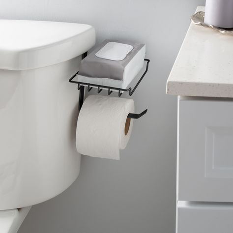 "Find the Bath Bliss Black Over the Tank Tissue Dispenser & Wipe Holder at Michaels. com. This innovative dispenser features an over the tank mechanism, allowing for easy installation without the need for drilling or additional hardware. Simply hang it over the tank of your toilet, and you're good to go. Designed with practicality in mind, your toilet paper is always within arm's reach, ensuring a seamless bathroom experience. This innovative dispenser features an over the tank mechanism, allowi Bathroom Wipes Holder, Tiny Bathroom Sink, Seamless Bathroom, Tiny House Storage Ideas, Bathroom Wipes, Diy Toilet Paper Holder, Stacked Laundry Room, Wipe Holder, Guest Bathroom Decor