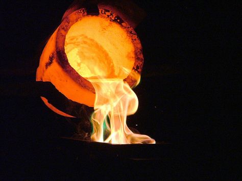 Liquid gold being poured into a cast to make a bullion bar at a Gold Reef City demonstration. Even the crucible glows under the immense heat. Liquid Gold, Cool Websites, The Fire, Paper Lamp, Precious Metals, South Africa, It Cast, Gold, Art