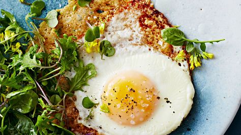 Grated Parmesan becomes irresistibly crisp and lacy when added to a hot skillet, taking ordinary fried eggs to new heights. Fried Egg Recipes, Bitter Greens, Egg Recipes For Breakfast, Fried Eggs, Egg Dish, Diet Vegetarian, Best Breakfast Recipes, Egg Breakfast, Savory Breakfast