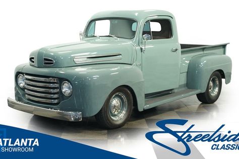 This 1948 Ford F-1 pickup rolls up with an Abyss Gray coat that's as tough as the truck itself. A classic hauler with modern muscle, it sits lower and meaner on its 15-inch wheels. The front... 1950 Truck, 1948 Ford Pickup, 1948 Ford Truck, Gray Coat, Classic Pickup Trucks, Ford Pickup, Grey Coat, Ford Truck, Ford Trucks