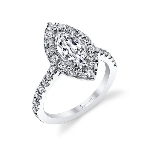 Style# S1199-MQ Classic Marquis Halo Diamond Engagement Ring - This beautiful engagement ring features a marquise cut center diamond with a total of 0.74 carats of diamonds in our signature halo and diamond shank. https://www.sylviecollection.com/classic-marquis-halo-diamond-engagement-ring-s1199-mq Sylvie Engagement Rings, Halo Engagement Ring Oval, Classic Halo Engagement Ring, Ring Around The Rosie, Infinity Wedding Band, Moissanite Engagement Ring White Gold, Diamond Half Eternity Band, Luxury Engagement Rings, Double Halo Engagement Ring