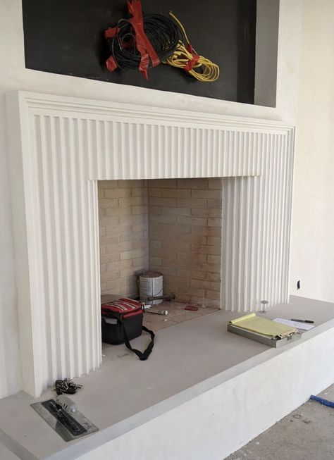 Fluted Marble Fireplace, Precast Fireplace, Wealthy House, Fluted Fireplace, Fluted Tile, Fireplace Accent Wall, Mirror Fireplace, Fireplace Accent Walls, Stone Fireplace Makeover