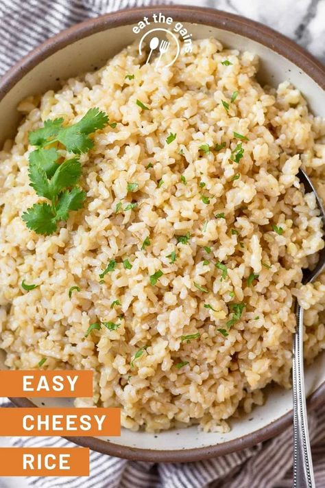 This homemade cheesy rice recipe is an easy and delicious way to add some flavor to plain rice. Made with either white or brown rice and shredded cheese, serve it as an easy side dish for your next meal!