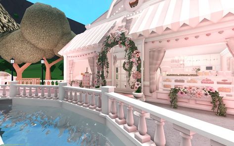 Pink Cafe Bloxburg Decals, Blush Bakery Bloxburg, Bloxburg Pink Cafe Interior, Cafe And House Bloxburg, Bloxburg Tea Party, Blush Town Bloxburg, Cafe Bloxburg Ideas Inside, Coquette Exterior Bloxburg, Pastel Cafe Bloxburg