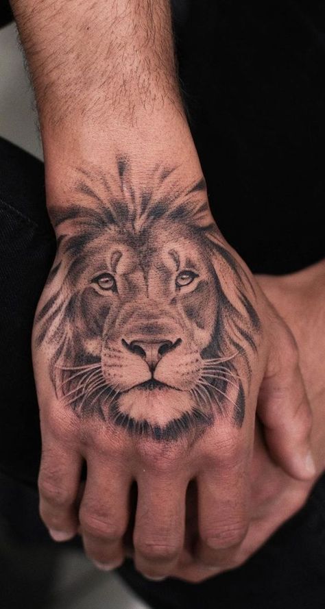 Want to get a lion tattoo but don’t know which design to choose? We gathered for you the 63 best lion tattoos for men and their meanings! Lion Hand Tattoo Men, Tiger Hand Tattoo, Lion Hand Tattoo, Small Lion Tattoo, Herren Hand Tattoos, Lion Forearm Tattoos, Lion Tattoo Sleeves, Lion Tattoos, Mens Lion Tattoo