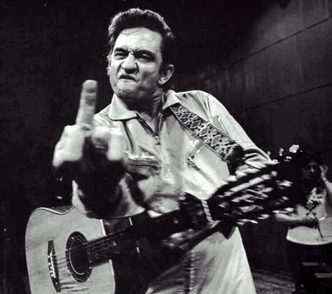 some say, 'the best rock n roll photo of all time'...by Jim Marshall Johnny Cash Poster, Johnny Cash Middle Finger, Public Enemies, Jim Marshall, San Quentin, Hulk Smash, Musica Rock, Men In Black, Rock N’roll