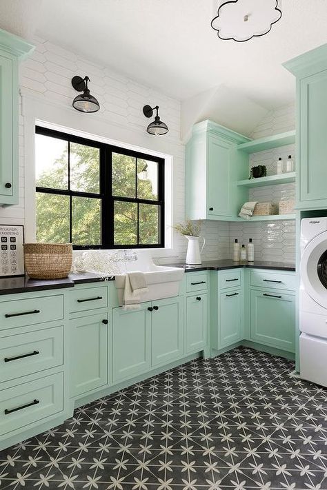 Charming mint green laundry room features gorgeous black and white mosaic floor tiles. Modern Classic Interior Design, Bold Tile, House Entry, Faux Brick Panels, Basement Garage, Modern Classic Interior, Green Laundry, Lake House Kitchen, Homestead Ideas