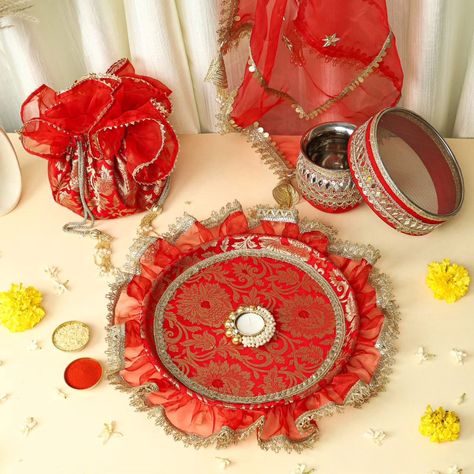 Let's celebrate this karwa chauth festival more attire and beautiful way let's grab our beautiful customised banarasi karwachauth thali set. Karwachauth thali set contains 1 decorated thali (12 inch) 1 thal cover (20 by 20) 1 chalni 1 lota 1 diya 1 potli with frill DM us for more details or WhatsApp us on 9867422790 Karwa Chauth Thali, Thali Cover, Karwachauth Thali, Karwa Chauth Gift, Wedding Prep, Let's Celebrate, All Craft, Gift Hampers, Lets Celebrate