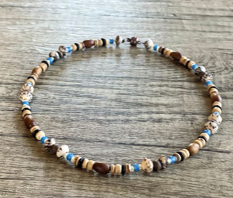 Excited to share the latest addition to my #etsy shop: Shell Surfer Necklace, Wooden Bead Necklace, Natural Beaded Choker, Mens Surfer Necklace, Surfer Choker, Unique Mens Jewelry, Beach Choker #brown #blue #men #glass #bohohippie #shellsurferchoker #surfernecklace #woodenbeadnecklace #naturalbeadchoker Surfer Necklaces, Beach Choker, Attractive Packaging, Surf Necklace, Wooden Bead Necklace, Bead Choker Necklace, Wooden Bead Necklaces, Face Necklace, Surfer Necklace