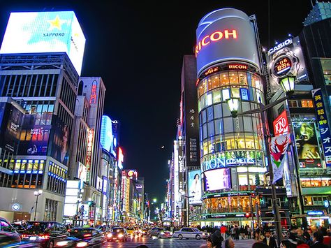 Ginza District, Tokyo, Japan... I need to spend more time here Tokyo Neighborhoods, Japanese Holidays, Lights At Night, Cheap Vacation, Tall Buildings, Tokyo Hotels, Visit Japan, City Street, Vacation Places