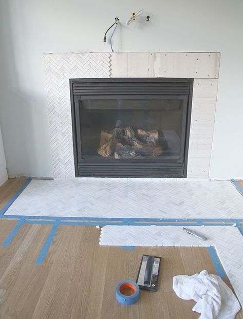 Pulled apart individual tiles to use as border between surround and hearth. Would work for inside firebox on mine. Marble Herringbone Fireplace, Herringbone Fireplace Surround, Herringbone Fireplace Tile, Herringbone Tile Fireplace, Herringbone Fireplace, Hearth Tiles, White Grout, Marble Herringbone, Build A Fireplace