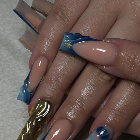 I have so many sets I need to post, like over 100😭😭 BUTTT look at these nails I slayeddd #explorepage #explore #fortcollinsnailtech #denvernailtech #acrylics #gold #chrome #nailinspo #trendingnails #nailsnailsnails #naillife #summerdesigns #blue #acrylicsnails #long #3dmax #3d #square Navy Nails Square, Navy Blue Birthday Nails, Blue And Gold Nails Short, Blue And Gold Acrylic Nails, Blue Gold Nails, 3d Square, Gold Acrylic Nails, Navy Nails, Winter Ball