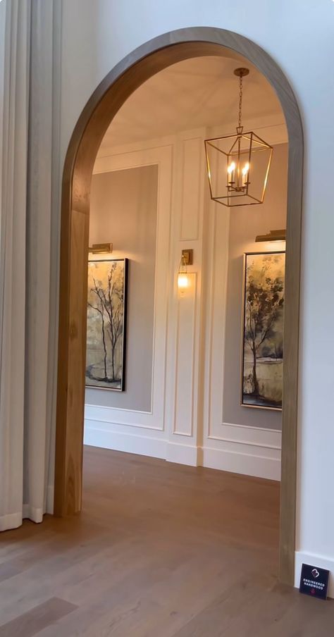 Grand Entrance Home, House Walkway Entrance Inside, Diagonal Interior Design, Arch House Design Interior, Tall Corner Fireplace Wall High Ceilings, Vaulted Ceiling Wall Panelling, Modern Cozy Home Decor, Historic Homes Interior Decor, Spec Home Upgrades