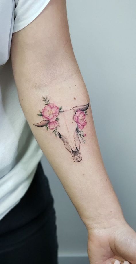 Step into the farmyard of fashion with cow tattoo designs! We've rounded up over 70 cow tattoo ideas that are just udderly irresistible. Longhorn Skull Tattoo With Flowers, Bill Skull Tattoo, Horn Tattoos For Women, Bull Skull Tattoo Women, Longhorn Skull Tattoo Women, Longhorn Tattoo Women, Taurus Bull Tattoos For Women, Taurus Minimalist Tattoo, Cow Skull Tattoo Flowers