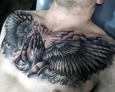 Mens Chest Tattoo Of Praying Hands With Angel Wings Chest Tattoo Wings, Tattoo Lower Back, Christus Tattoo, Wing Tattoo Men, Tato Flash, Full Chest Tattoos, Praying Hands Tattoo, Cool Chest Tattoos, Pieces Tattoo