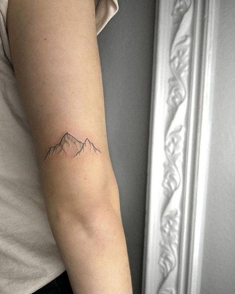 20 Mountain Tattoo Ideas for Women - Mom's Got the Stuff Two Mountains Tattoo, Glacier Tattoo Ideas, Mountain Tattoo Wrap Around, Arm Tattoos Line Work, Fine Line Mountain Tattoo Forearm, Mountain Bicep Tattoo, Trail Running Tattoo Ideas, Mt Everest Tattoo, Snowy Mountain Tattoo