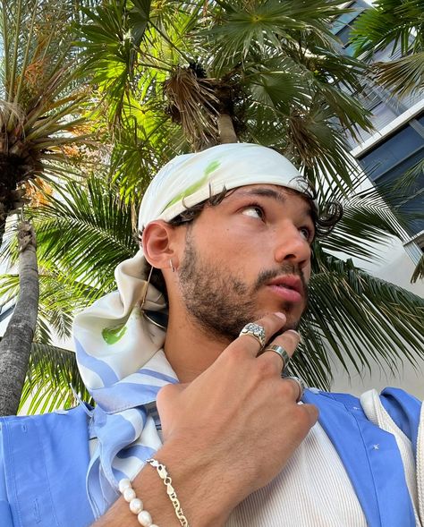 ill be home soon 🏝️ ——— blue outfit, men’s fashion, accessories inspo, men’s jewelry, spring outfit, shorts, head scarf, silk, summer fashion, pearls Head Scarf Outfit Men, Men Head Scarf, Men’s Bandana Outfit, Men Wearing Bandanas On Head, Men’s Head Scarf, Blue Outfit Men, Bandana Outfit, Outfit Shorts, Siargao