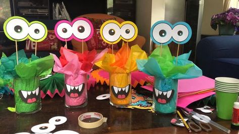 Halloween DIY Decorations using Dollar Tree items (tutorials included) Monster Party Activities, Monster Party Centerpiece, Monster Birthday Party Decorations, Monster Theme First Birthday Party, Cute Monster Decorations, Monster Table Decorations, Diy Monster Party Decorations, Monster Theme Birthday Party Decoration, Diy Monster Birthday Decorations