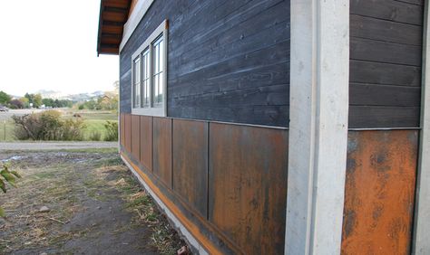 Really like the 'flat panel' metal here for the base of the home. Normally i use the corrugated, but i like this better.  I also like the really dark wood here; but would prefer in a vertical position. Metal Siding House, Sugi Ban Wood, Lakehouse Exterior, Corrugated Metal Siding, Mountain Home Exterior, Steel Siding, Burned Wood, Siding Options, Lakeside Cottage