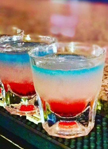 Find out how to make the perfect bomb pop shot with blue curaçao, cherry liqueur and pina colada mix. Cheers! Bomb Pop Shot, Pina Colada Mix, Bomb Shots, Cocktail Drinks Alcoholic, Pudding Shots, Cherry Liqueur, Bomb Pop, Cocktail Drink, Shot Recipes