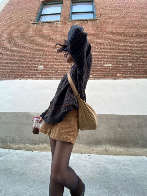 Fit inspo, ootd, fit pic, grandpa sweater, fuzzy sweater, brown sweater, uniqlo crescent bag, uniqlo side bag, uniqlo crescent tan bag, corduroy mini skirt, mini skirt, corduroy skirt, black tights, docs, brown leg warmers, sunglasses, iced latte, aesthetic, cute, vintage, thrift Brown Cord Skirt, Beige Corduroy Skirt Outfit, Uniqlo Corduroy Bag, Brown Cord Skirt Outfit, How To Style Corduroy Skirt, Courdory Skirt Outfit Fall, Brown Courdory Skirt Outfit, Uniqlo Crescent Bag, Outfits With Brown Skirt