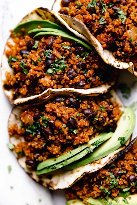 Quinoa Black Bean Tacos with Cilantro Lime Crema – Your new favorite vegan taco recipe! Easy vegan tacos made with hearty black bean quinoa taco meat. This easy taco recipe comes together in 30 minutes or less. It's made with pantry staples. Naturally vegetarian vegan, dairy-free, gluten-free. #playswellwithbutter #vegetariantacos #blackbeantacos #tacotuesday #vegantacos #plantbasedrecipesforbeginners #plantbasedmeals #plantbaseddinner #veganrecipes #vegandinner Quinoa Taco Meat, Cilantro Lime Crema, Plantbased Dinner, Vegan Tacos Recipes, Quinoa Tacos, Bean Quinoa, Vegan Journey, Easy Taco Recipes, Lime Crema