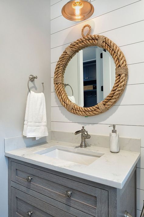 Mirror with rope frame accentuates the coastal appeal in this white powder room [From: Andrea Swan – Swan Architecture] Rope Mirror Bathroom, Nautical Mirrors, Jute Rope Mirror, Round Mirror With Rope, Tiny Powder Rooms, Tiny Powder Room, Mudroom Makeover, Upcycle Furniture, Rope Wall