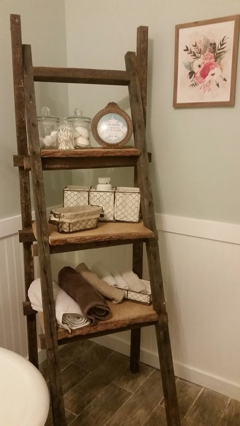 Farmhouse-Ladder shelf: Made out of 100 year old wood, used for bathroom toiletries and storage. Very rustic Ladder Shelf Wooden, Over The Toilet Storage Ideas Farmhouse, Ladder Shelf In Bathroom, Bathroom Bookshelf Storage, Vintage Ladder Shelf, Ladder Decor Bathroom, Ladder Shelf Decor Bathroom, Old Ladder Shelf, Ladder For Plants