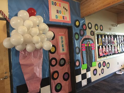 50's theme classroom door 50s Door Decorating, 50s Hallway Decorations, 50s Diner Classroom Theme, 50s Theme Classroom Door, Grease Door Decorations, 80s Classroom Door, Diner Classroom Theme, 50s Classroom Theme, Hoco Decorations