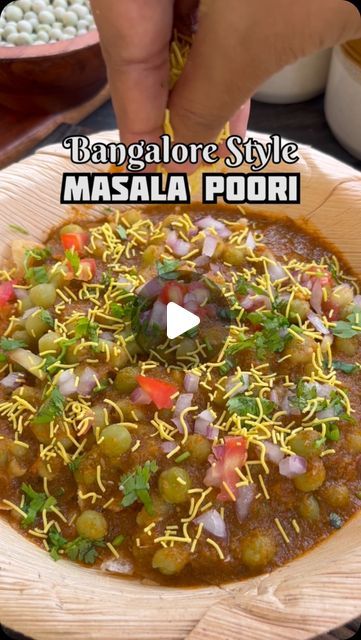 Mad Over Food on Instagram: "Tag all Masala Puri Lovers 💕.
Bangalore’s famous Street food, Masala Puri. 
Recipe: 
1. Soak 1/2 cup dry Green peas for 5hrs or overnight. Add to a pressure cooker. Pour 1 cup water, salt and cook for 5 Whistles on medium flame.
2. In a Pan heat 1 tbsp oil. Add 2 cloves, 1tsp Cumin, 1/2 inch cinnamon, 4 Garlic cloves, 1/2 inch ginger, 2 green chillies. Next add 1 sliced Onion and Sauté for 3-4 mins in high. 
3  Now add 1 sliced tomato and cook till it softens. Cool and transfer to a mixing Jar. To this add 1/3 cup mint leaves and 2/3 cup Coriander leaves. Add some water and blend to smooth paste. 
4. Heat 1 tbsp oil in a Pan and add Spices ( 1tsp each red chilli, Amchur, 1/2 tsp each Coriander, Cumin and Garam masala powder). Fry for a min on low. Now add the Masala Puri Chaat Recipe, Chaat Recipe Street Food, Indian Fruit Salad Recipe, Masala Puri Recipe, Masala Puri, Famous Street Food, Garam Masala Powder, Masala Powder Recipe, Puri Recipe