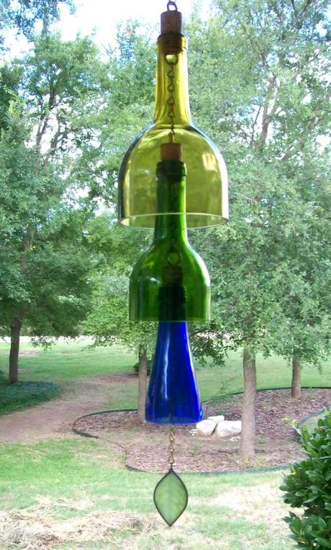 You think that the old bottles can be only used to store the jams again. Then you are wrong. Bottles and jars will be turned into many useful things that maybe you haven’t thought before. Why not check the DIY crafts out here and make your old jars useful. What’s more, DIY crafts need your … Wine Bottle Wind Chimes, Wine Bottle Ideas, Diy Wind Chimes, Wine Bottle Art, Bottle Ideas, Wine Bottle Crafts, Wind Chime, Bottle Art, Outdoor Projects