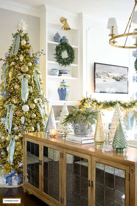 Christmas Decorations Dining Room, Ribbons On Chandeliers, Blue And White Christmas Kitchen, Red Green And Blue Christmas Decor, Coastal Christmas Table, Traditional Modern Christmas Decor, Blue White Christmas Decorations, Green And Blue Home Decor, Grandmillennial Christmas