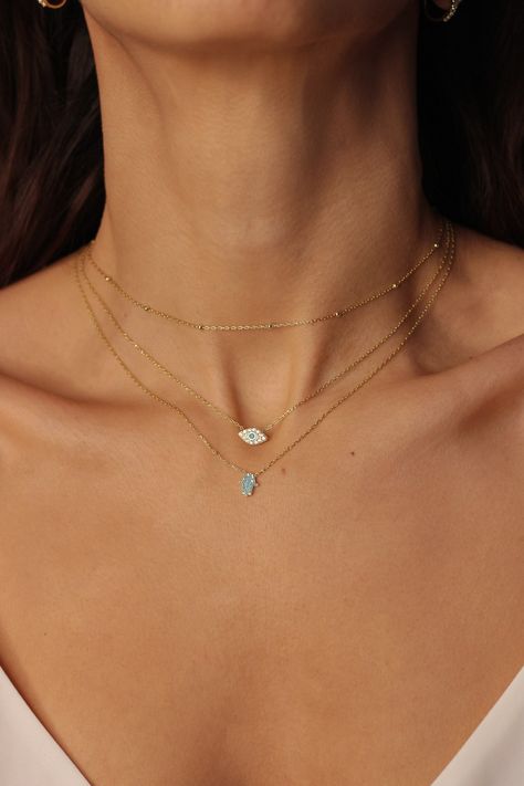 Evil Eye Layered Necklace, Evil Eye Gold Necklace, Manifesting Wishes, Layered Necklaces Gold, Minimalist Accessories Jewellery, Gold Chocker Necklace, Evil Eye Crystal, Delicate Diamond Necklace, Hamsa Hand Necklace