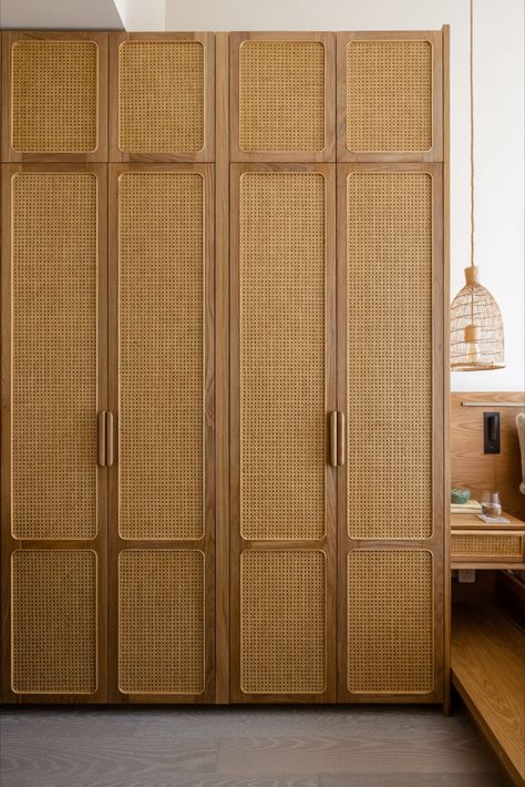 Our storage cabinet keeps things neatly organized with its adjustable shelves in the interior, and drawers and open shelves with adjustable heights. This cabinet is designed to be a sustainable piece of furniture with its solid wood handles, FSC certified solid wood trims, and bamboo and rattan finish. Rattan Finish Wardrobe, Boho Wardrobe Closet, Bamboo Wardrobe Doors, Jute Wardrobe Doors, Wooden Finish Wardrobe, Modern Wardrobe Design Ideas, Rattan Bedroom Design, Rattan Door Cabinets, Rattan Wardrobe Design