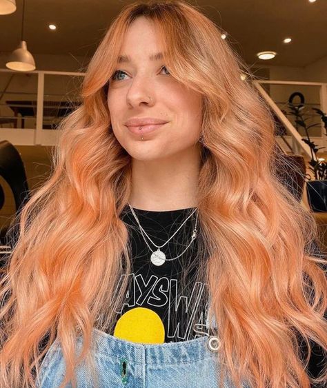 Golden Peach Hair Color Is The Unexpected Pastel Pink Sister That’s Trending This Fall Golden Peach Hair, Peach Copper Hair, Golden Copper Hair Color, Peach Hair Dye, Golden Copper Hair, Pastel Orange Hair, Pink Peach Hair, Apricot Hair, Peach Hair Colors