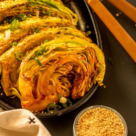 An addictive spicy sauce that gets its "kick" from gochujang dresses up Grilled Cabbage Wedges with a Korean Glaze... This grilled cabbage is anything but bland, and super easy to make! Serve with your favorite Asian main dish and shake things up a bit! Healthy, gluten free, low carb, and delicious! Asian Roasted Cabbage, Roasted Napa Cabbage, Cabbage Sides, Baked Cabbage Wedges, Grilled Cabbage Wedges, Korean Sides, Grilled Cabbage Steaks, Miso Rice, Korean Cabbage