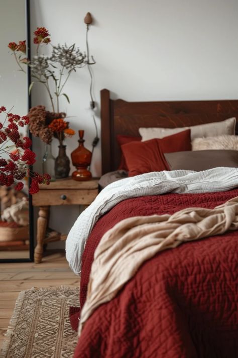 If you’re thinking of sprucing up your space, warm burgundy bedroom ideas could be just the heartwarming change you crave! Imagine creating a cozy escape accented with rich maroon tones and elegant fixtures. From stylish bedding to charming decorative touches, design your ideal retreat that invites relaxation. Whether a full makeover or simple updates, burgundy can instantly transform your space. Explore these cozy decor suggestions that blend comfort and style effortlessly—for your very own haven to unwind after a long day! Rose And Burgundy Bedroom, Red Comforter Bedroom Ideas, Red Bedding Aesthetic, Cozy Red Bedroom, Bedroom With Red Accents, Dark Red Bedroom, Brown Bedroom Colors, Bedroom Ideas Red, Maroon Bedding