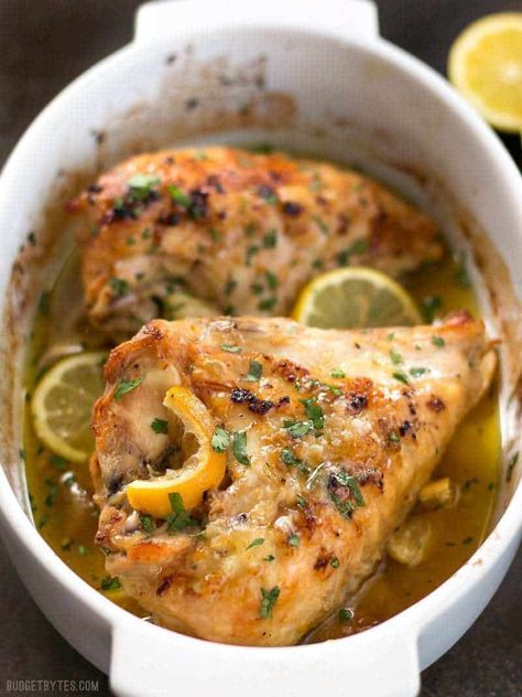 This low and slow cooking method makes this Lemon Garlic Roasted Chicken incredibly tender, juicy, and flavorful! BudgetBytes.com Split Chicken Breast Recipes, Best Roast Chicken Recipe, Lemon Garlic Chicken Breast, Split Breast Chicken Recipes, Garlic Roasted Chicken, Split Chicken, Split Chicken Breast, Roasted Garlic Chicken, Cheese Cheddar